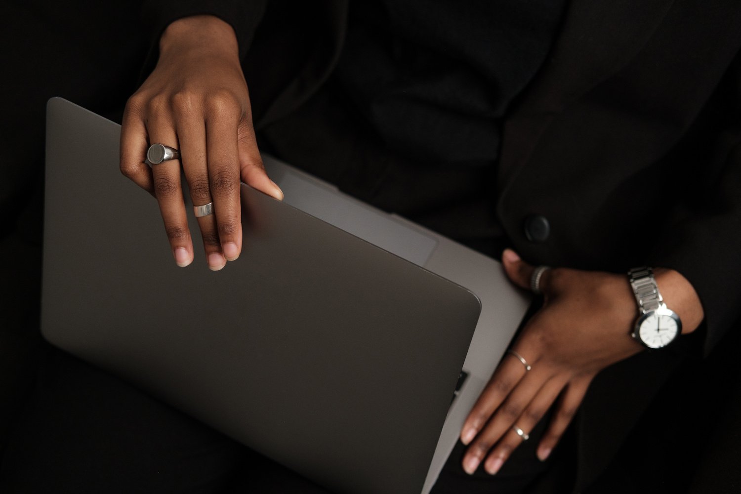 Woman Closing the Laptop